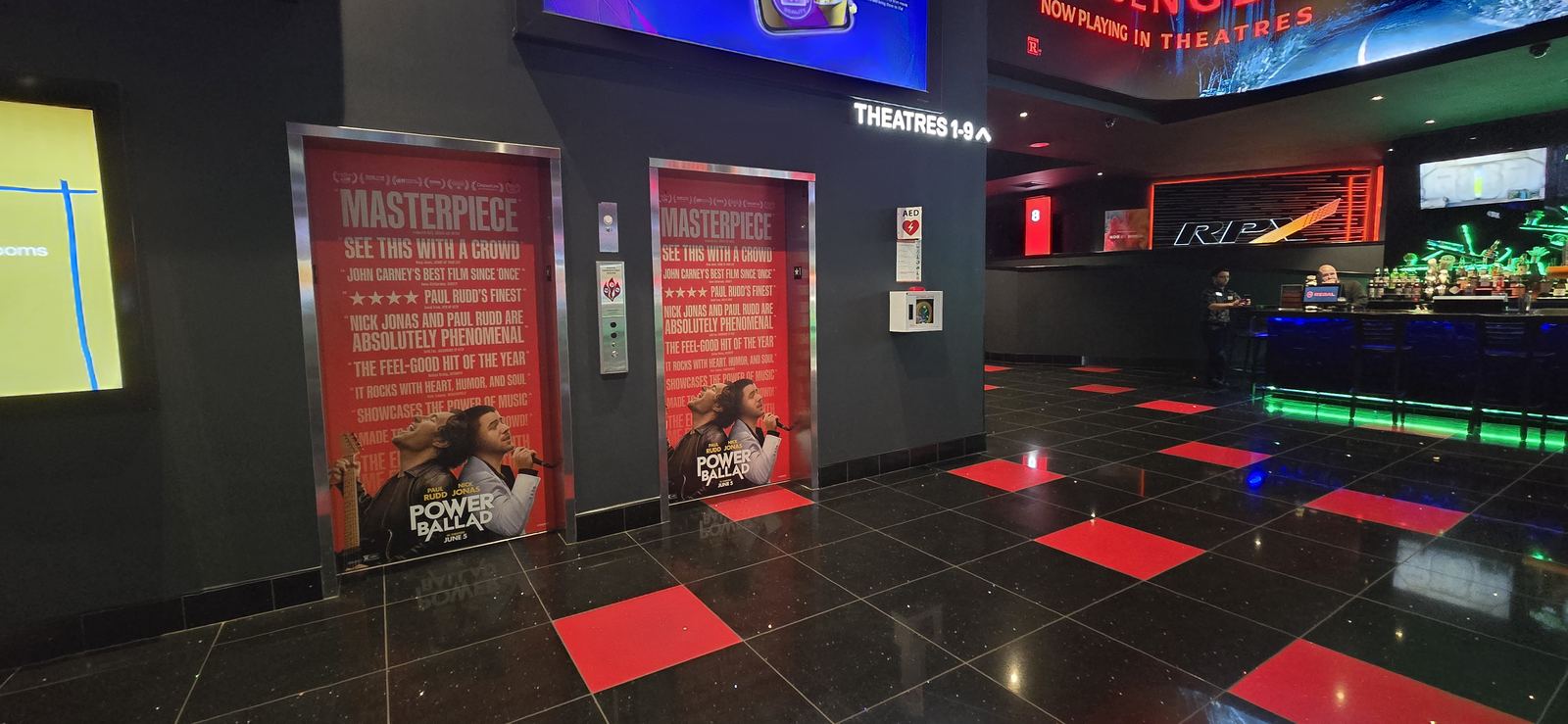 Power Ballad — Regal Dania Pointe Elevator Wraps